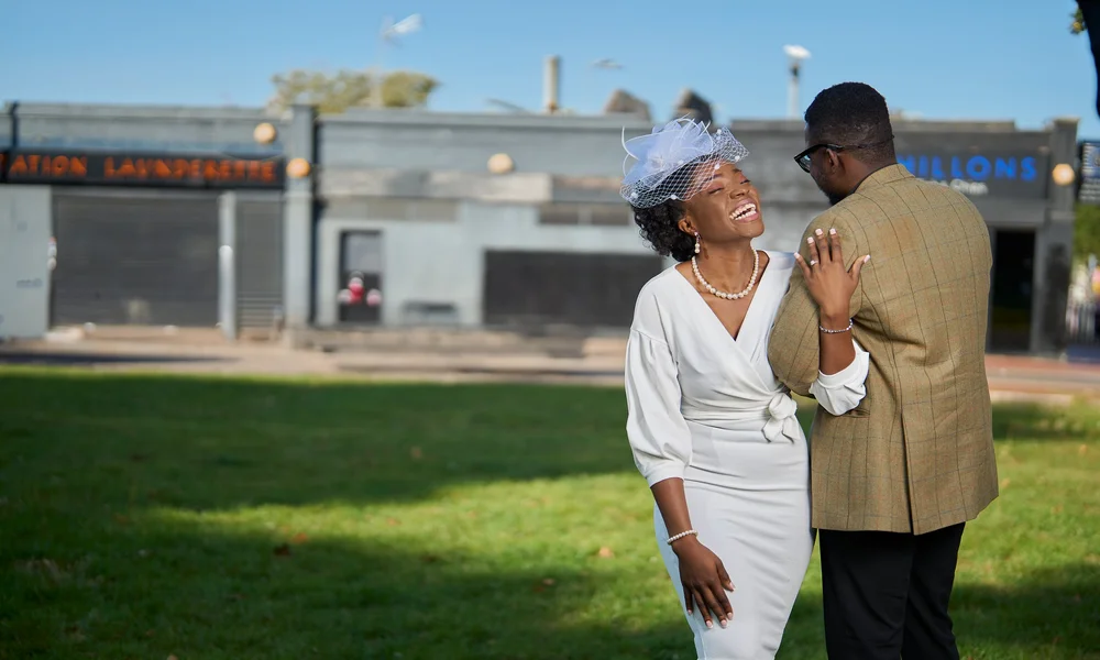 Wedding photography vs videography London - photographer and videographer working together at ceremony